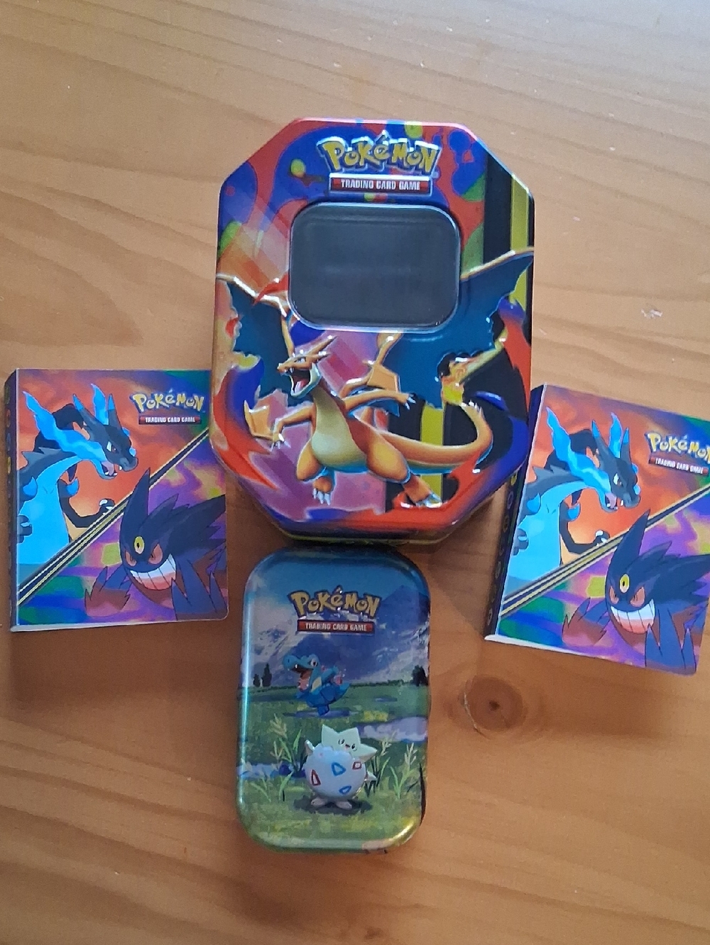 Pokemon Tin Set with Charizard & Gengar Artwork — Red, Blue, Purple